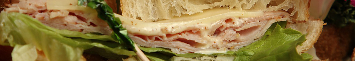 Eating Sandwich at Baldinos Giant Jersey Subs restaurant in Hinesville, GA.